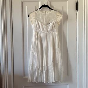 BCBG white dress with lace details